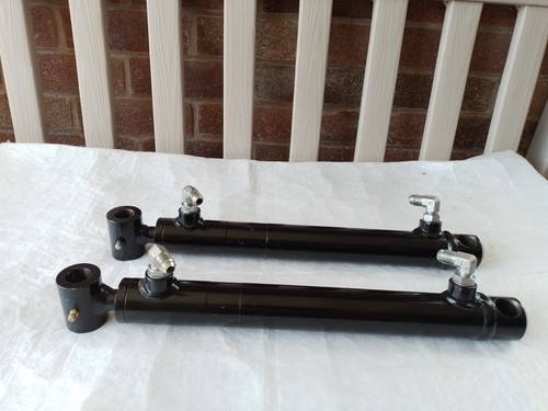 Hydraulic body tip rams